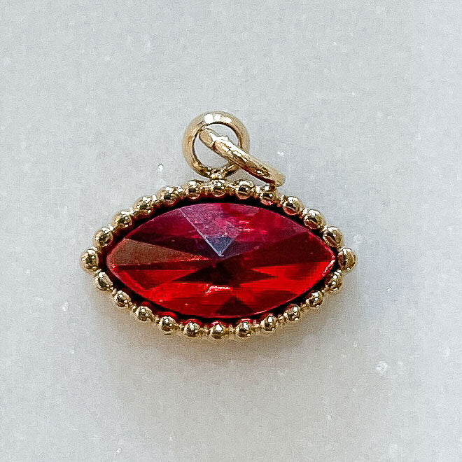 Charms Strass oeil rouge