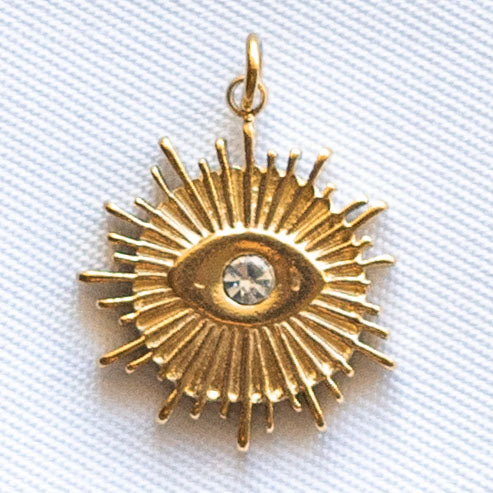 Charms Soleil gravé d un oeil avec strass